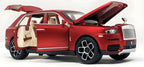 Red diecast luxury car with open doors and hood on a white background