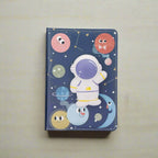Diary with squishy cartoon astronaut and planets design 