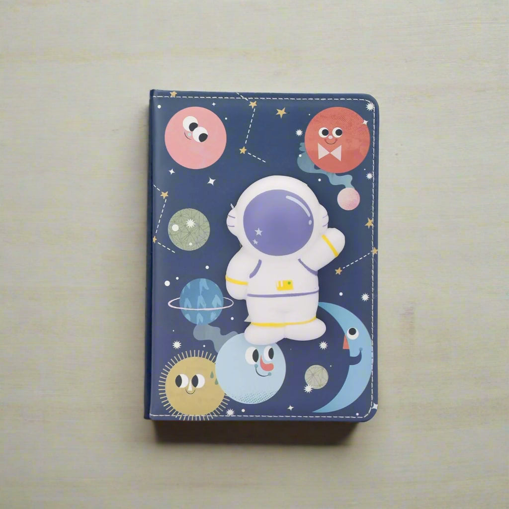 Diary with squishy cartoon astronaut and planets design 