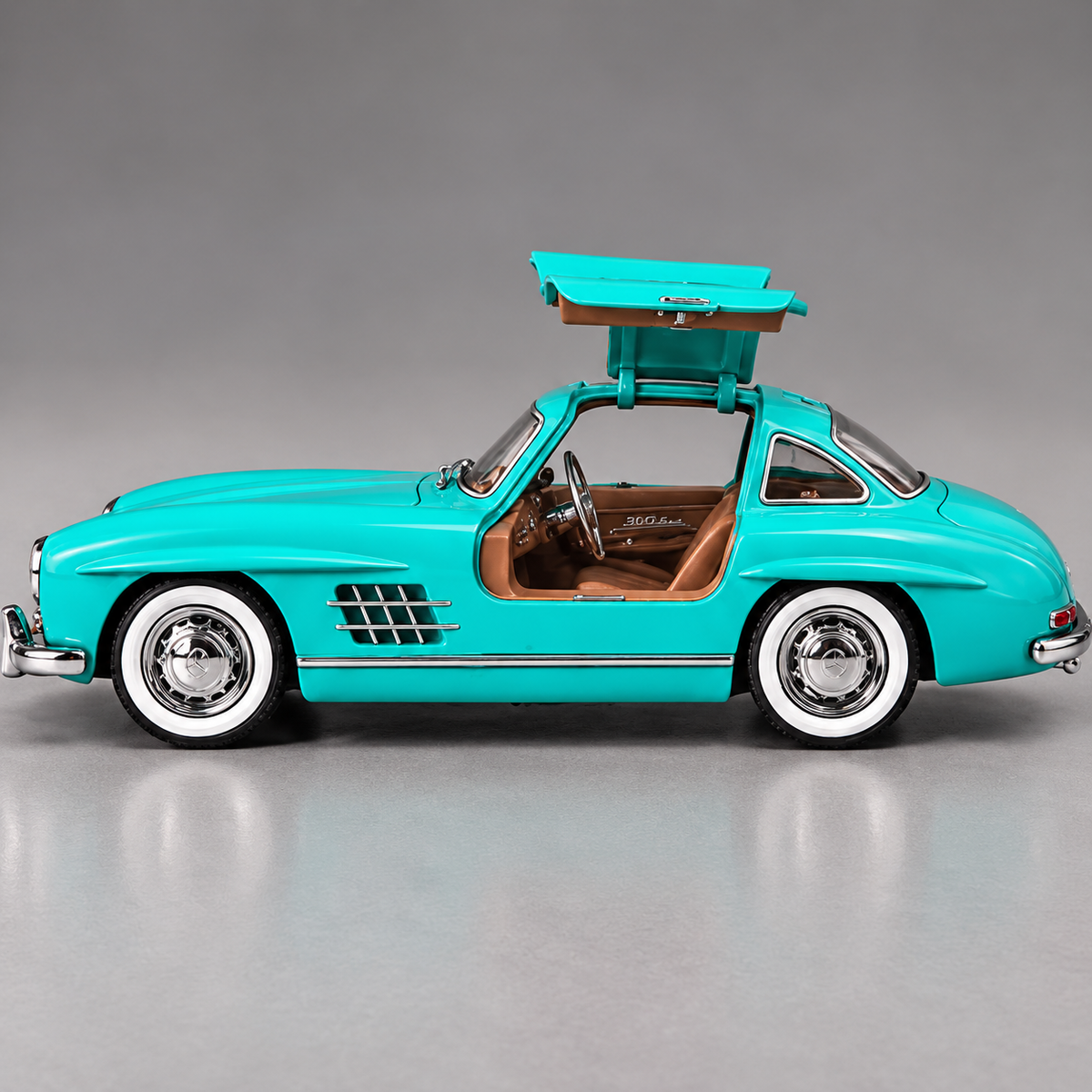 Mercedes-Benz 300 SL Gullwing 1:22 Scale Diecast Model Car – Greenish Blue Edition